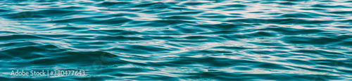 Abstract water background, sea waves, play of ripples