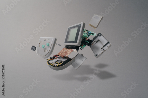 Disassembled Old Portable Gaming Console photo