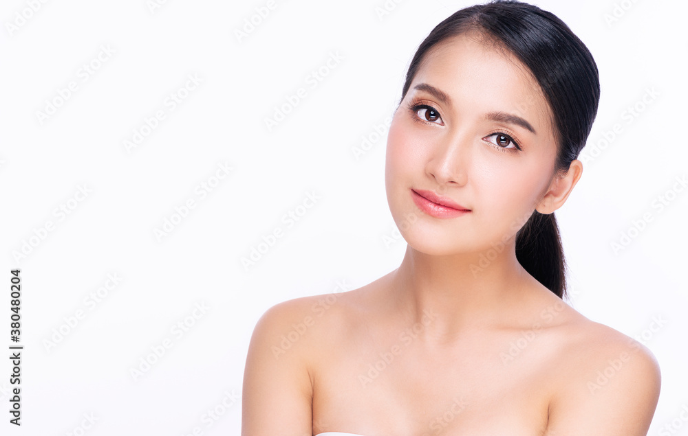 Charming young woman looking at camera smile with clean and fresh skin with positive emotional over isolated on white background. Beauty and cosmetics concept. Charming young woman looking at camera smile with clean and fresh skin with positive emotional over isolated on white background. Beauty and cosmetics concept.