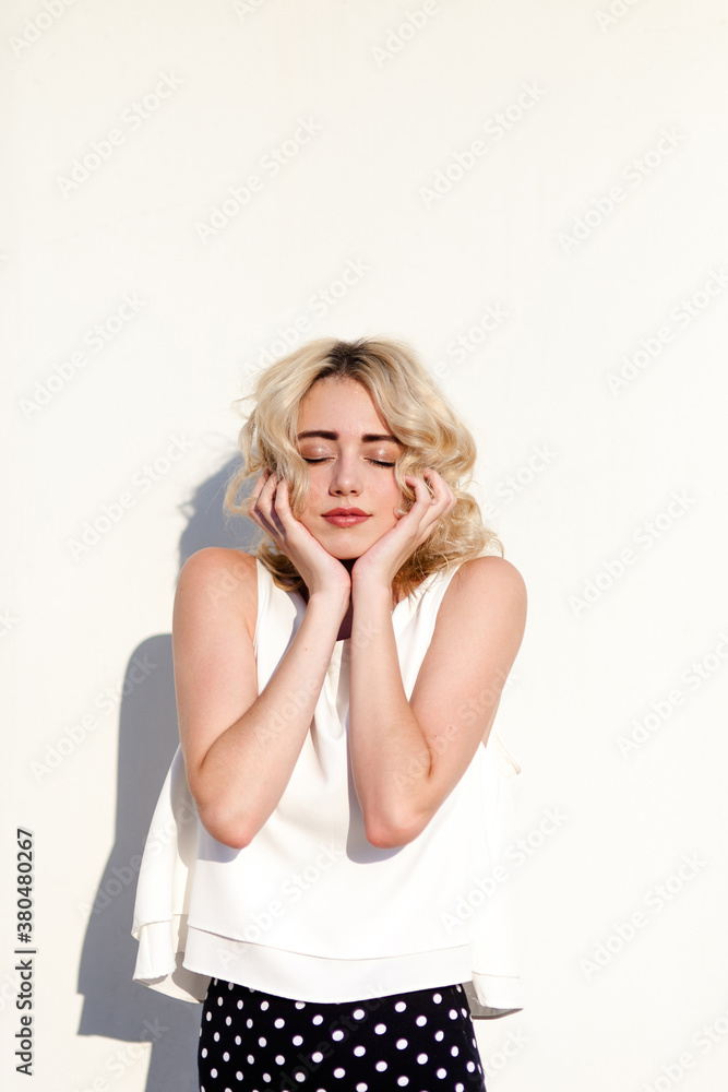 Woman with hands on her face Woman with hands on her face