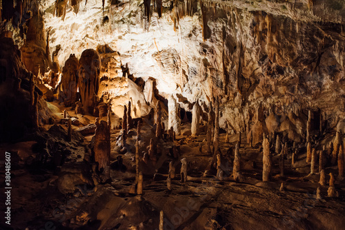 Limestone cave in Postonja, Slovenia photo