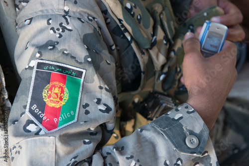 Afghan border police patch on uniform photo