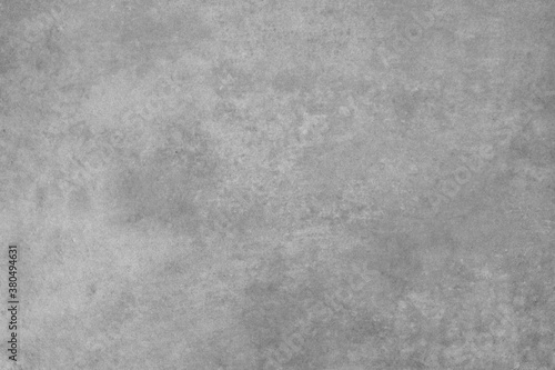 Raw beton brut grunge concrete wall or floor texture. Weathered cement modern interior design background wallpaper.