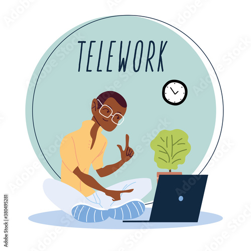 man working remotely from her home, telework