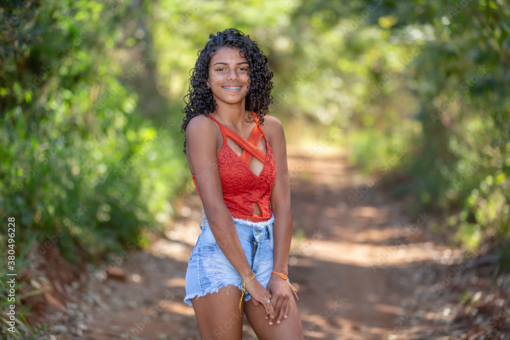 portrait of young woman smiling portrait of young woman smiling