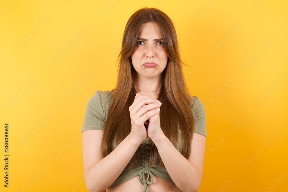 beautiful face of sad woman crying isolated on grey background desperate and depressed with tears on her eyes suffering pain and depression in sadness facial expression and emotion concept beautiful face of sad woman crying isolated on grey background desperate and depressed with tears on her eyes suffering pain and depression in sadness facial expression and emotion concept