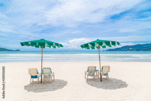 Chairs And Umbrella on the Beach. © gamjai