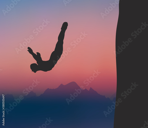 A Man Cliff Diving Under The Sunset