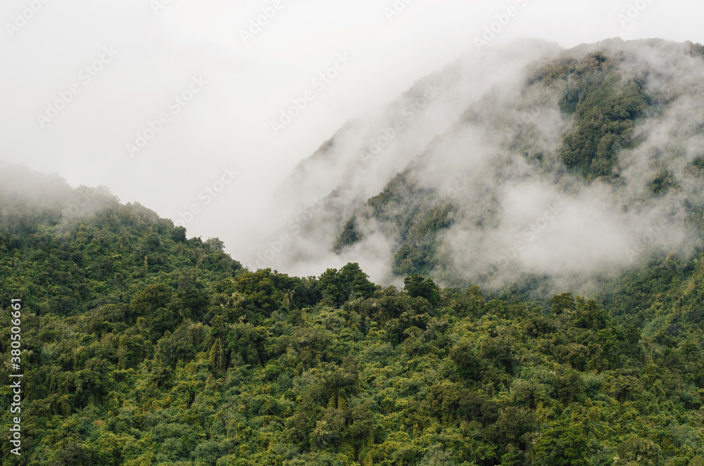 Dense fog around a mountain Dense fog around a mountain