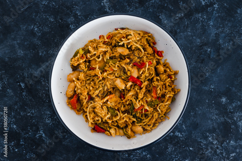 plant-based food, vegan ginger noodles with roasted peppers and butter beans