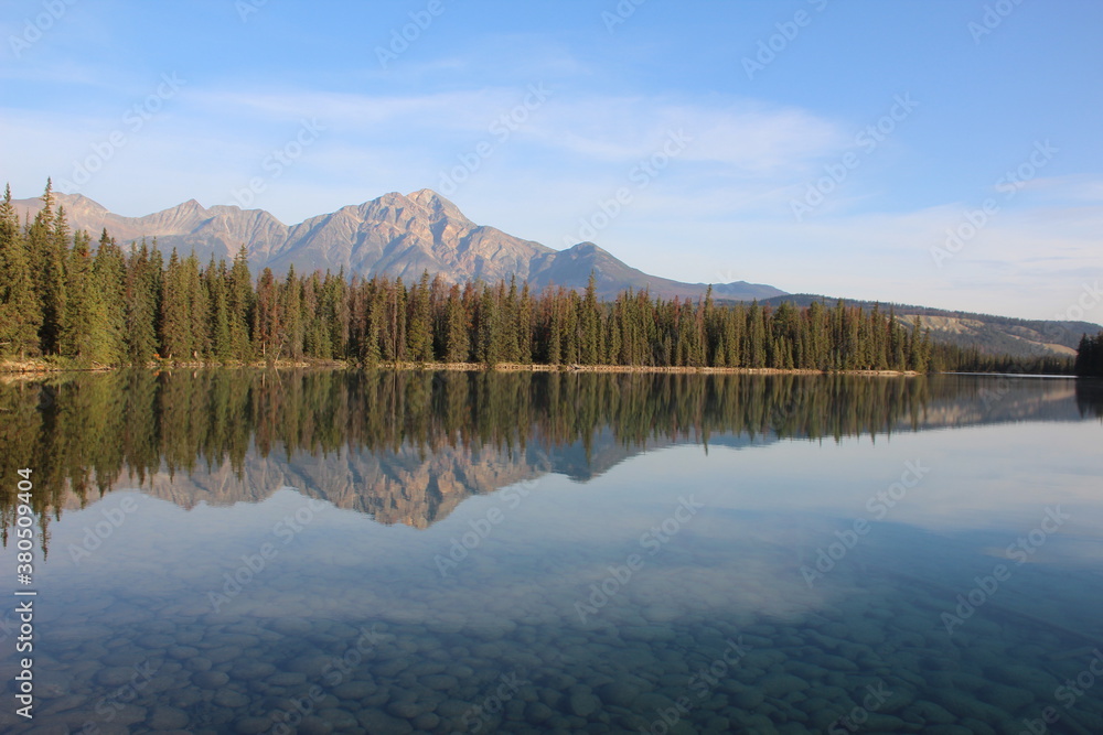 Fototapeta premium Reflections - Lake Beauvert, Jasper National Park, Alberta, Canada.