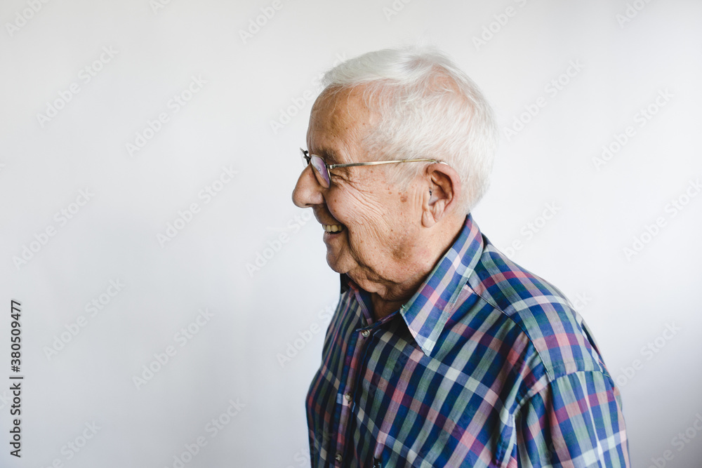 Senior man laughing candidly - on white background Senior man laughing candidly - on white background