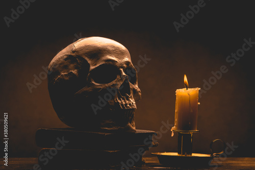 Wallpaper Mural Still life type a scene with human skull and candle Torontodigital.ca