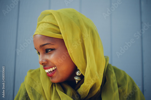 Somali-American woman with green hijab photo