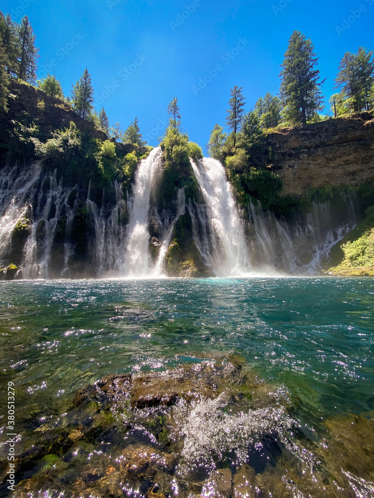 Fototapeta premium McArthur–Burney Falls Memorial State Park is the second oldest state park in the California State Parks system, located approximately 6 miles north of Burney, California. 