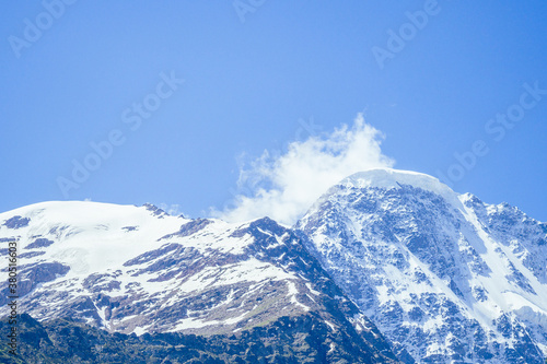 big Elbrus mountain in summe on cloudy day photo