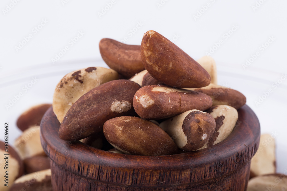 Brazil nuts close-up isolated on white background.