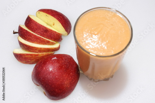 Fresh red apple juice isolated on white background