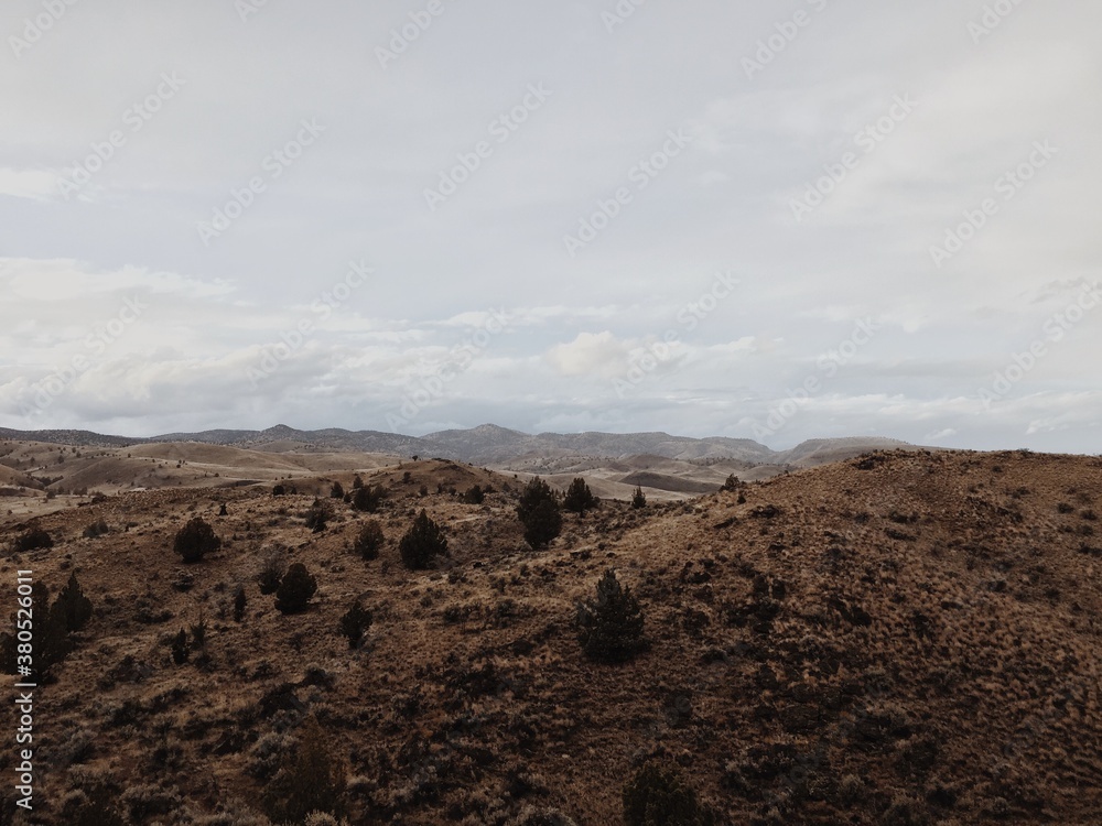 View of a hilly landscape in the desert View of a hilly landscape in the desert