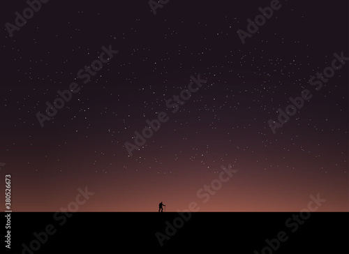 A Man Hiking In The Night