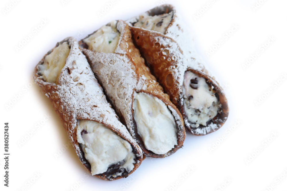 Traditional italian pastry called Cannolo with candied fruit and chocolate isolated on white background
Traditional italian pastry called Cannolo with candied fruit and chocolate isolated on white background