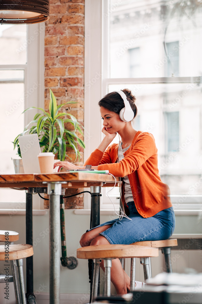 Ambitious Businesswoman working on technology laptop device at work startup Ambitious Businesswoman working on technology laptop device at work startup