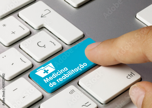 Medicina de reabilitação - Inscrição na tecla azul do teclado. photo