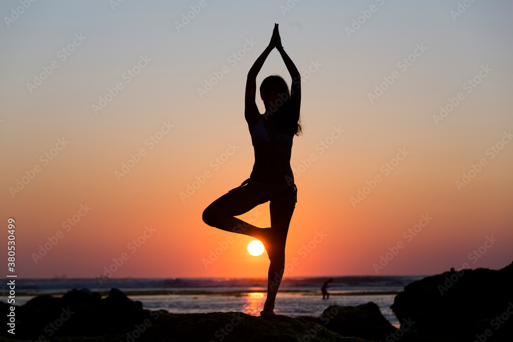 Young woman in yoga pose Young woman in yoga pose