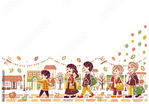 秋の紅葉　街並みを観光する三世代家族