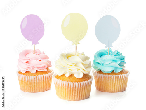 Tasty cupcakes with stylish...