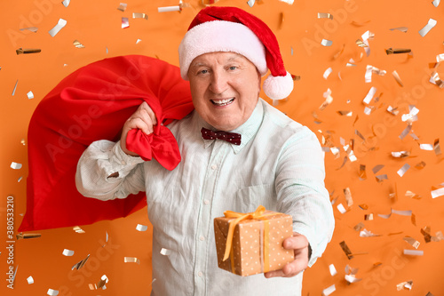 Elderly man celebrating Chr...