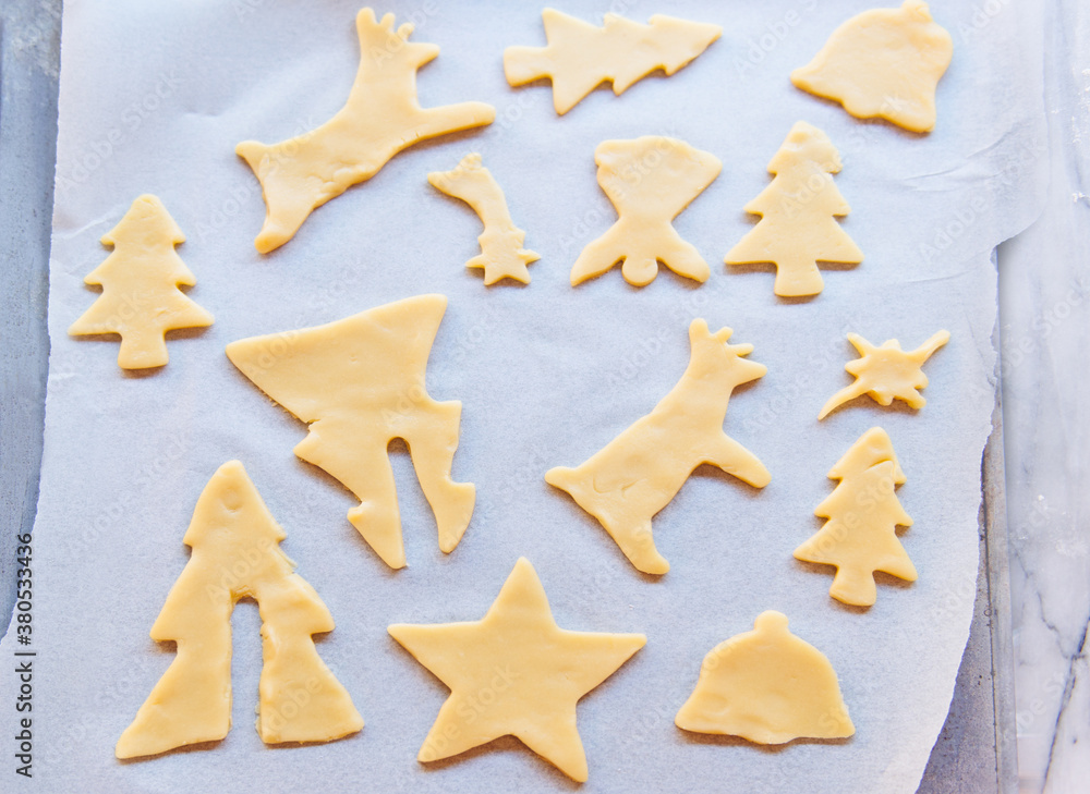 Christmas cookies on a tray ready to be cooked Christmas cookies on a tray ready to be cooked