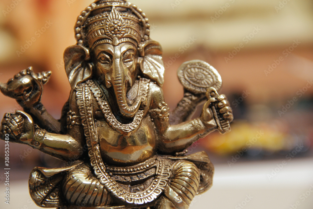 Close-up of figurine of god Ganesha Close-up of figurine of god Ganesha