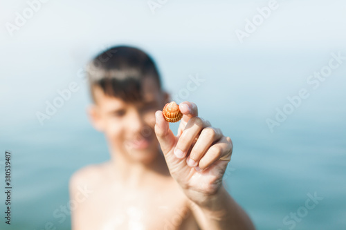 Holding found shell photo