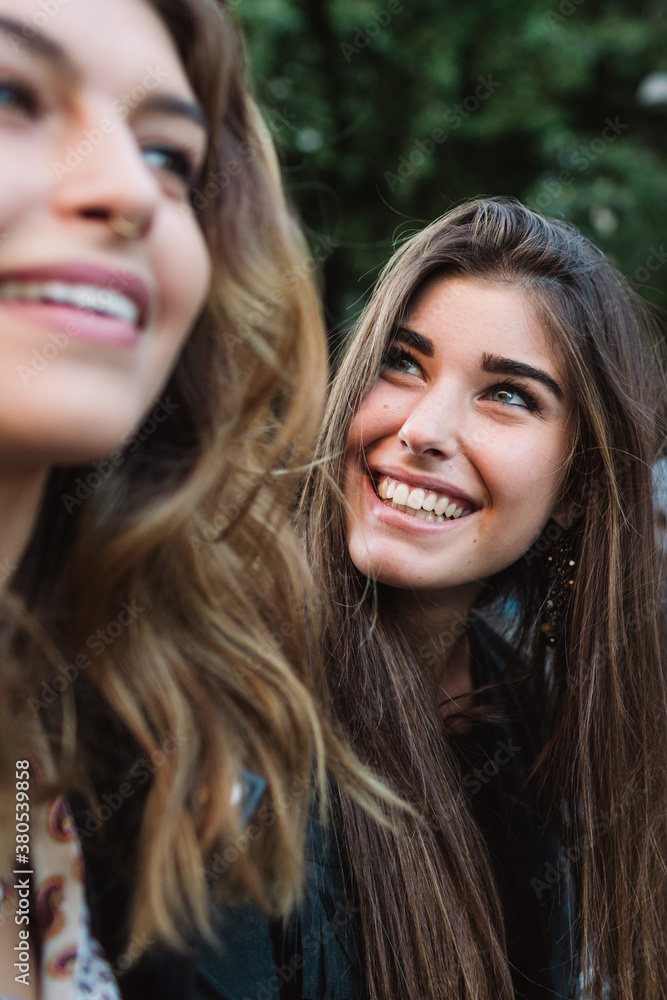 Female friends laughing together Female friends laughing together