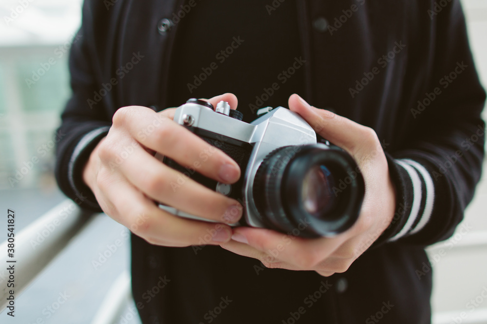 Creative man holding a camera. Creative man holding a camera.