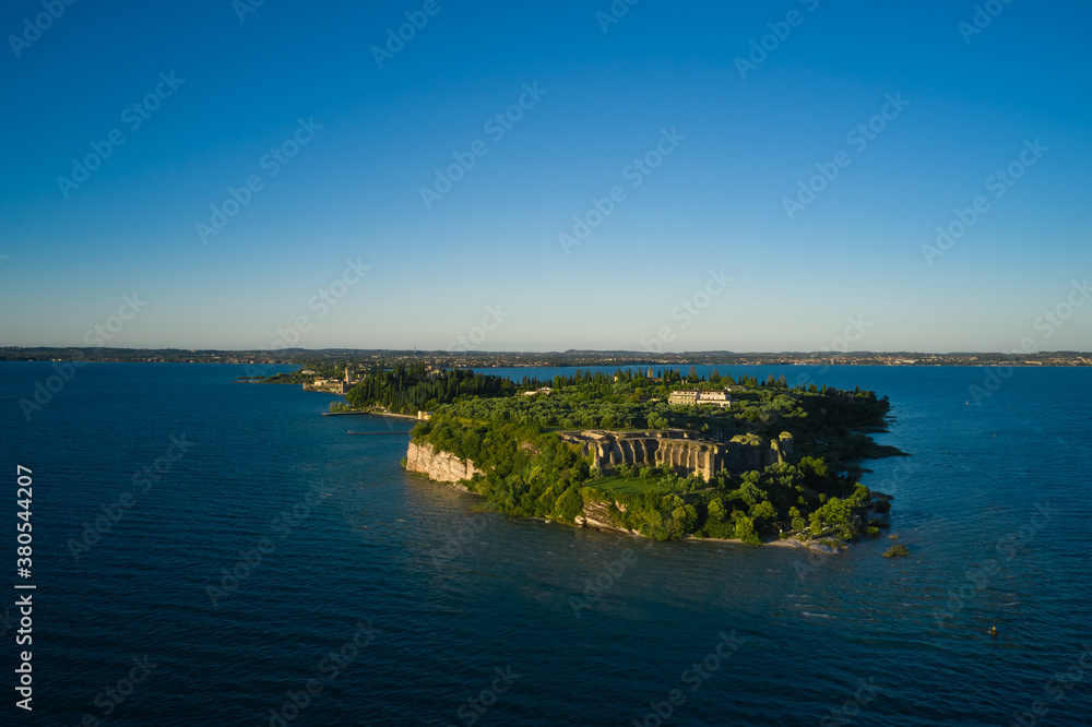 Archaeological site of Grotte di Catullo, Sirmione, Italy early morning aerial view. lake garda