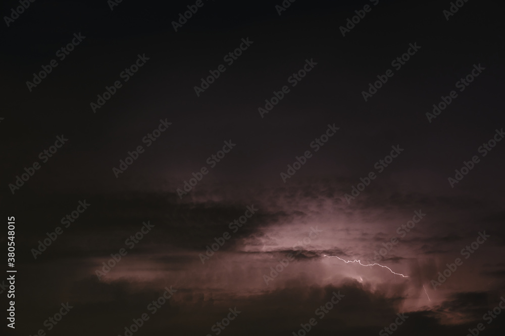 Lightning in the night sky. Lightning trail in the sky Lightning in the night sky. Lightning trail in the sky