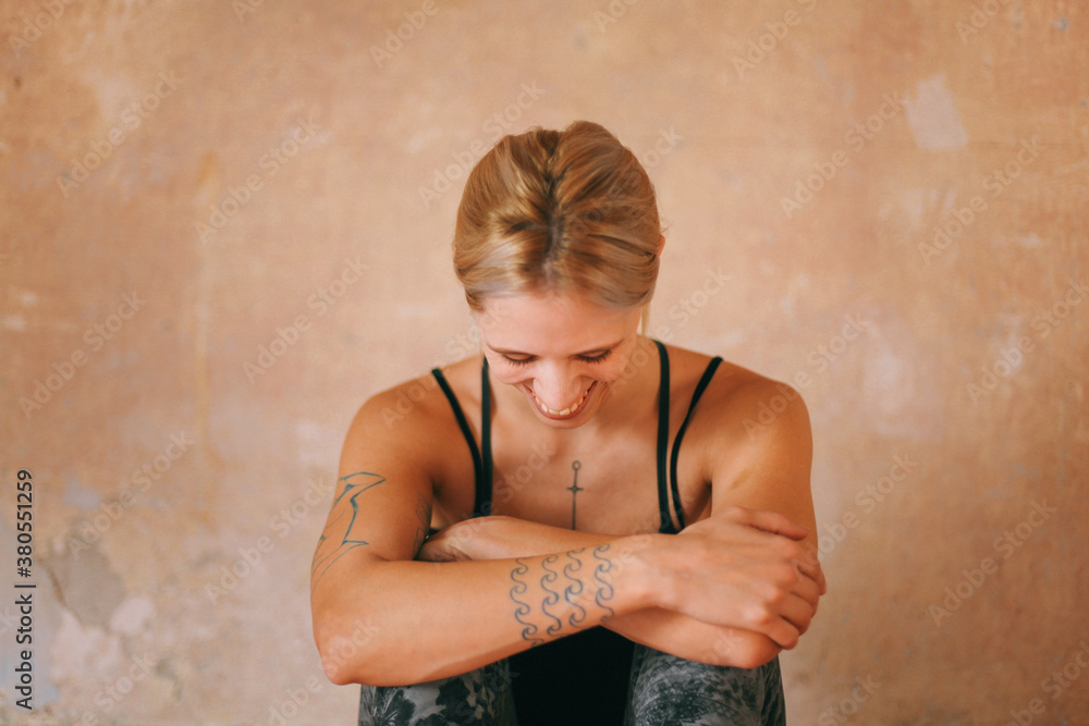 Beautiful tattooed woman smiling Beautiful tattooed woman smiling