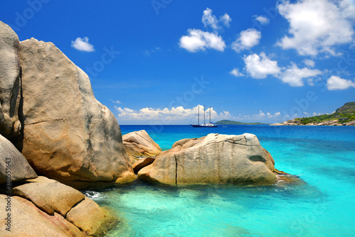 Big granite stones on the tropical beach, Coco Island, Indian ocean, Seychelles. Exotic destinations.
