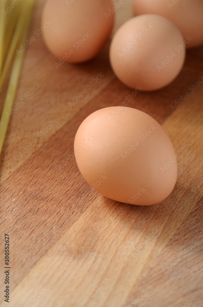 eggs on a wooden table eggs on a wooden table