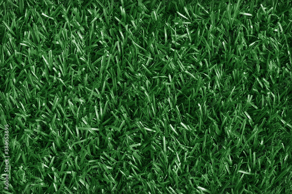 Top view of artificial dark green grass texture background. Top view of artificial dark green grass texture background.