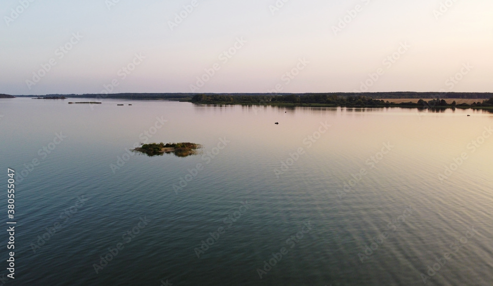 Top view of a calm large forest lake Top view of a calm large forest lake