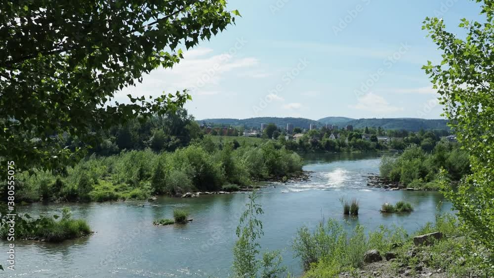 Rheinfelden in Switzerland - View on the old Rhine, natural and protected site from the right bank in Germany Baden-Württemberg 
