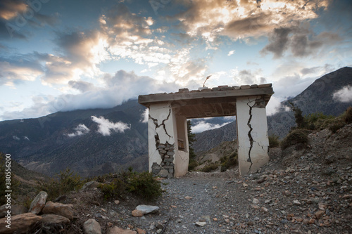 A broken gate in the himalayas after the Nepal earthquake. photo