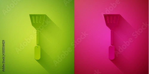 Paper cut Fly swatter icon isolated on green and pink background. Paper art style. Vector.