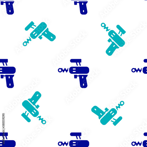 Blue Ray gun icon isolated seamless pattern on white background. Laser weapon. Space blaster. Vector.