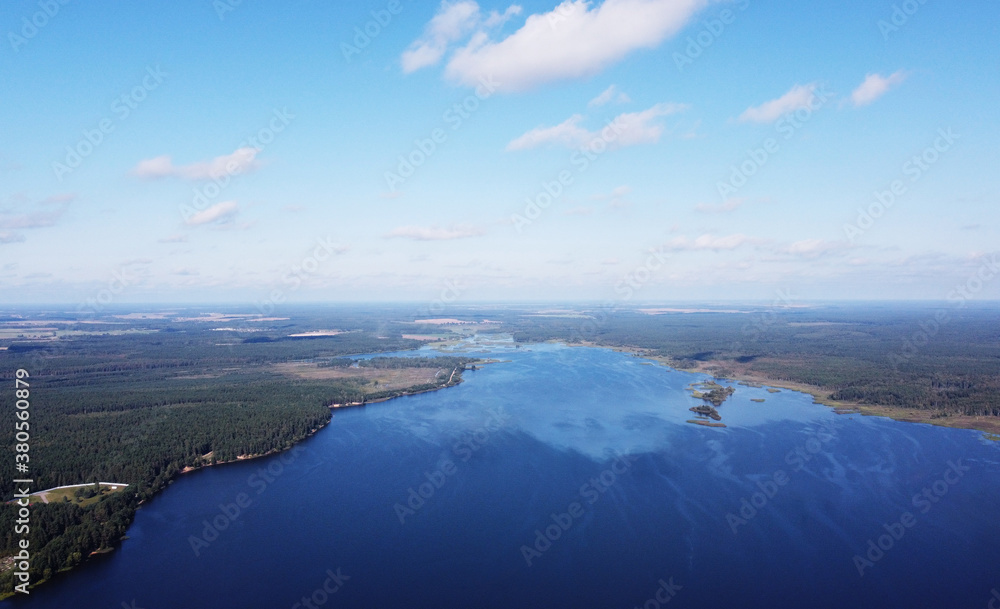 Aerial view of a beautiful calm blue forest lake Aerial view of a beautiful calm blue forest lake