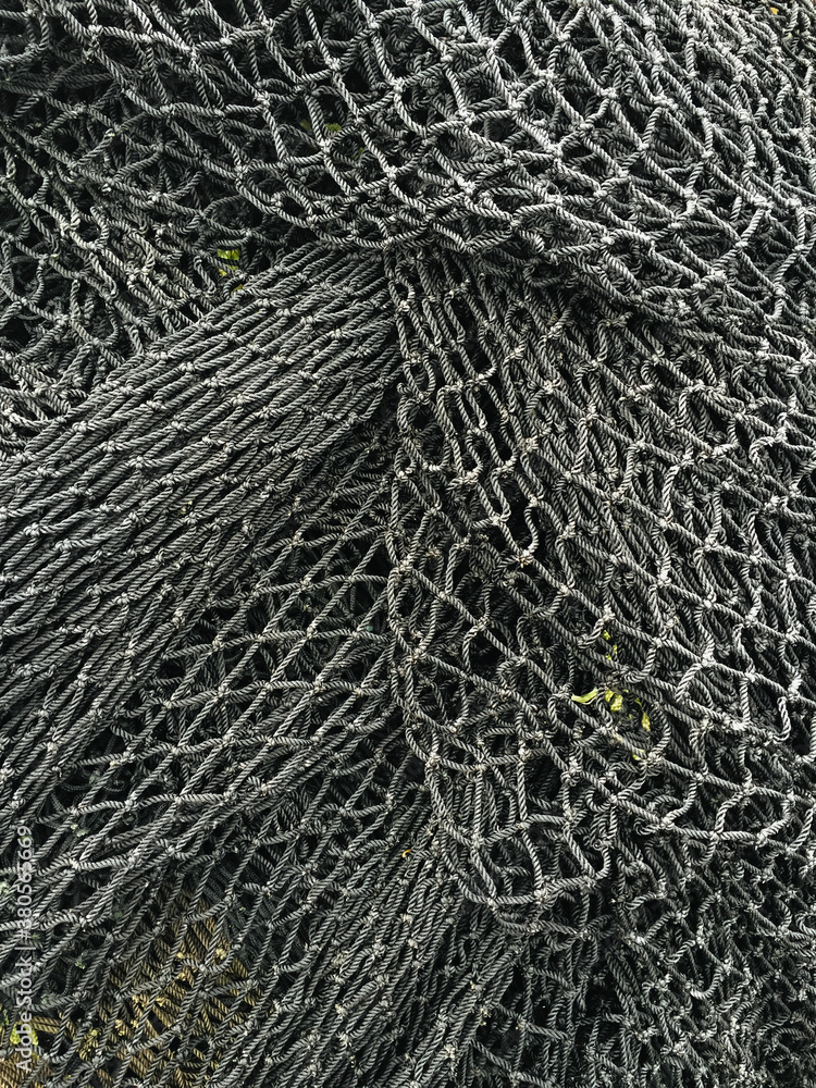 Close up of piles of commercial fishing nets Close up of piles of commercial fishing nets