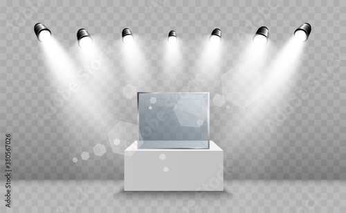 Glass showcase for the exhibition in the form of a cube. Background for sale illuminated by spotlights. Museum glass box isolated advertising or business design boutique. Exhibition hall.